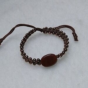 Adjustable brown and gold‎ woven bracelet